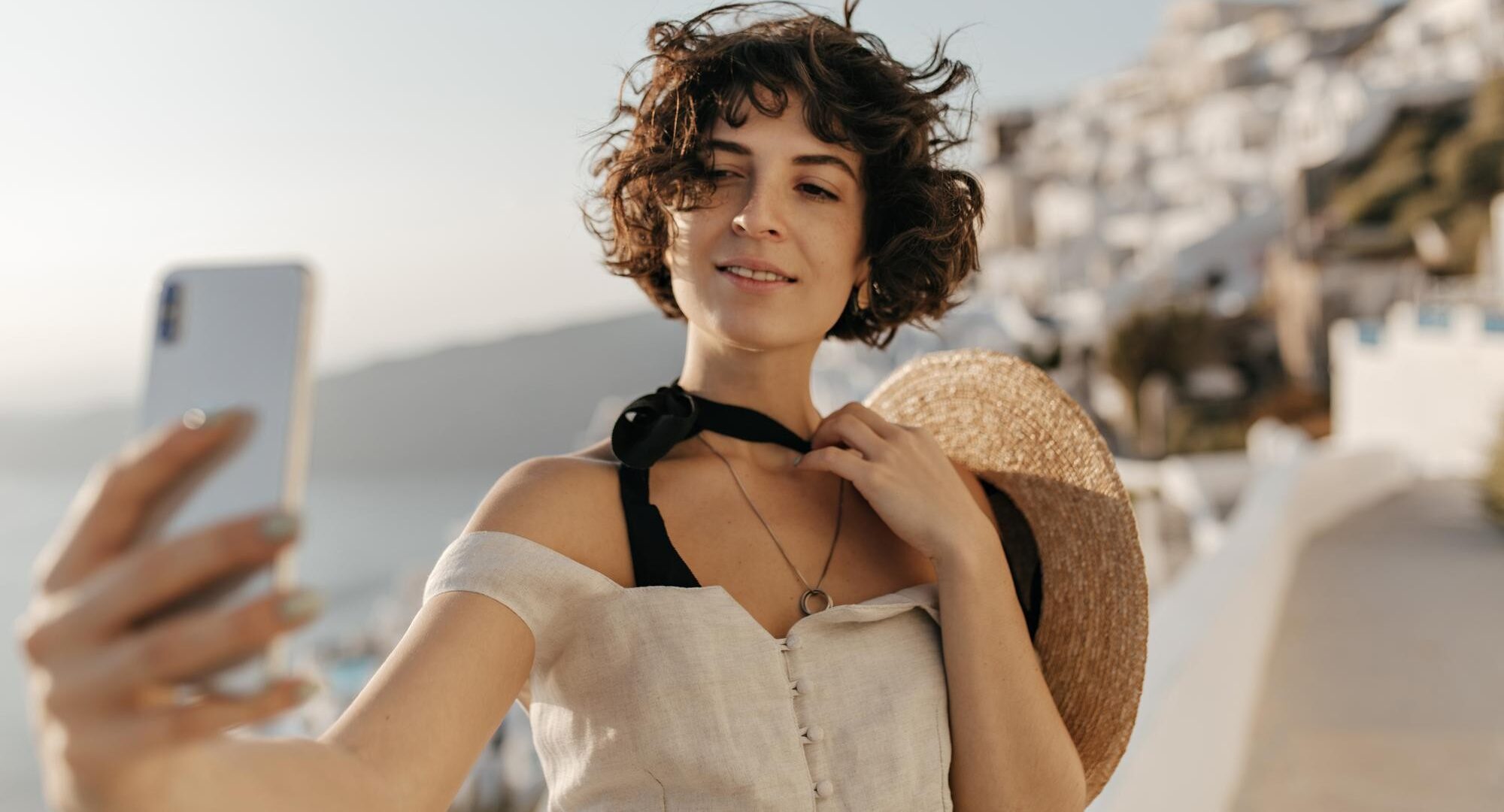 woman holding phone